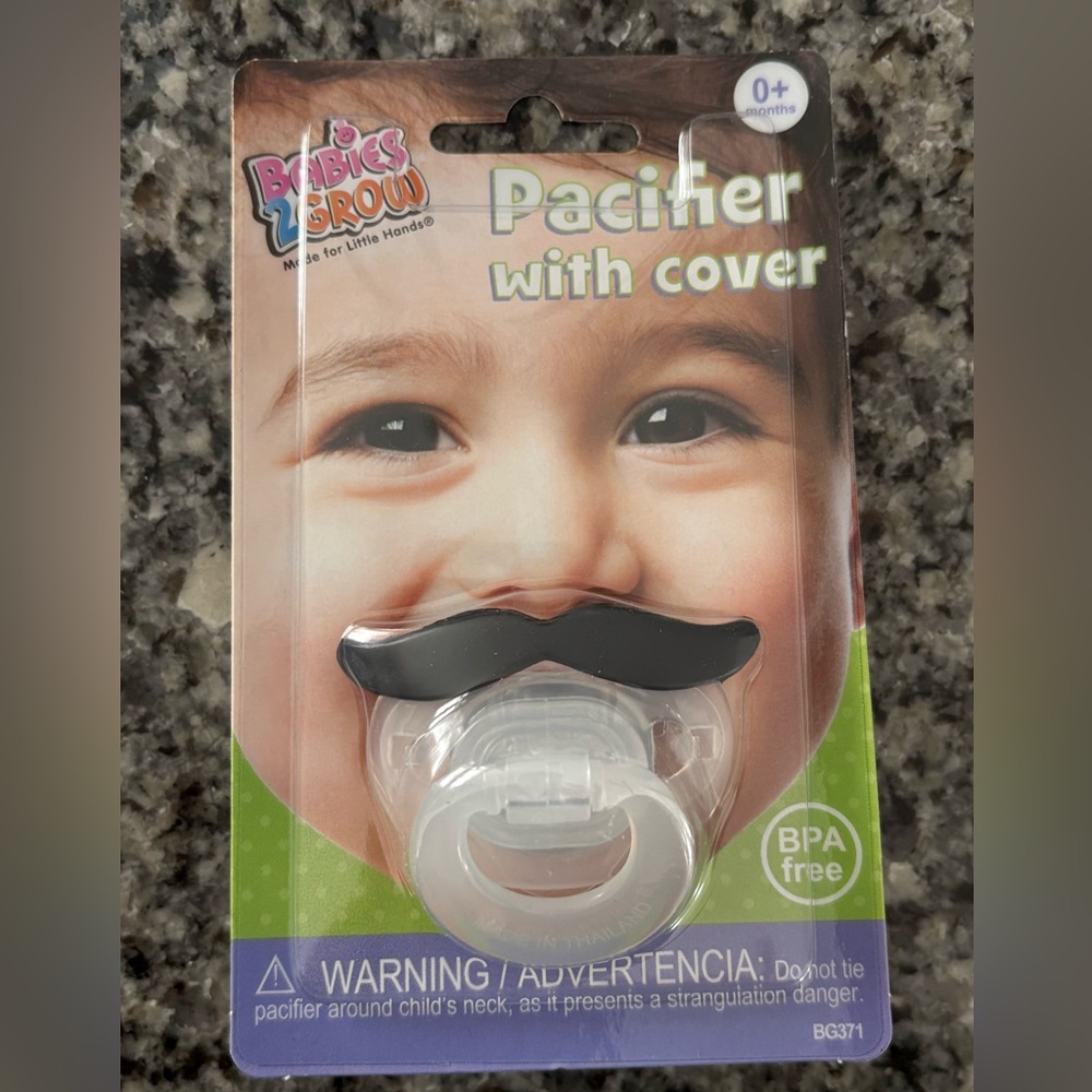 New in package- Babies 2 grow mustache pacifier, for age 0+